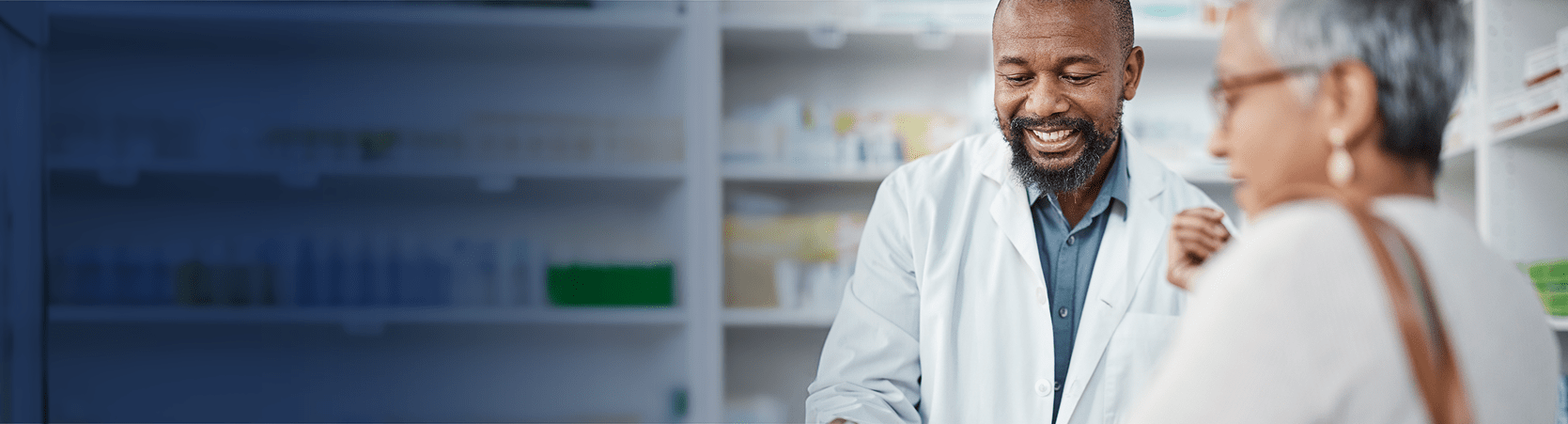 Image of pharmacist and patient